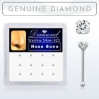 dnbpd box of silver nose bones with clear prong set diamond