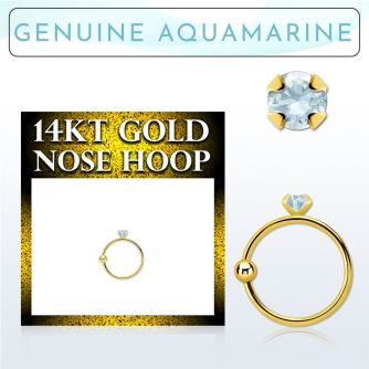 ghge8 14kt gold nose hoop w a 2mm prong set aquamarine stone