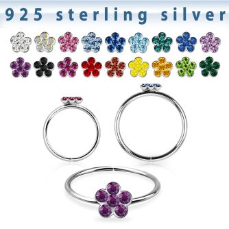 silver seamless nose hoop w crystals flower in the middle 