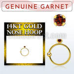 ghge2 14kt gold nose hoop w a 2mm prong set garnet stone