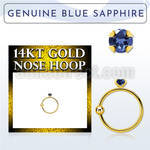 ghge9 14kt gold nose hoop w a 2mm prong set blue sapphire