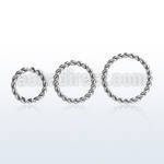 selw16 steel seamless ring w a twisted wire design 