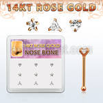 drnb21 caja display 9 piercing nariz hueso oro rosa 14 kts 0 6mm zirconia claras 3mm diversas formas estrella tri corazon distribuidor mayorista